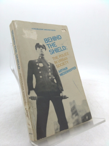 Behind the Shield: The Police in Urban Society