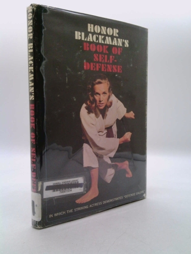 HONOR BLACKMAN'S BOOK OF SELF DEFENSE IN WHICH THE STRIKING ACTRESS DEMONSTRATES "DEFENSE GALORE"